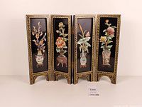 Front view of four-panel screen with hardstone floral inlay