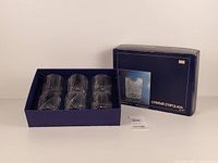 Box with six tumblers in tray