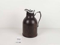 Full view of carafe showing overall form and finish