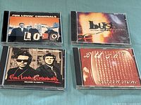 All four CD albums laid out together