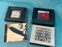 Front view of four Led Zeppelin CD releases