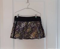 Front view of the skirt showing pattern, flat front and waistband