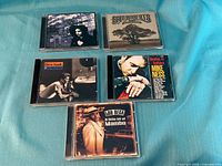 Front view of five CD cases