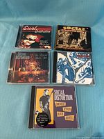Front covers of all five Social Distortion CDs