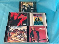 Front covers of all five CDs
