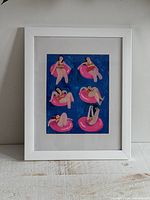 Full view of framed art print on surface