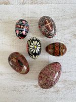 All six painted wooden eggs overview