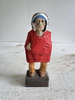 Front view of Tom Hannah carved wood chief figurine