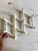 Rack folded showing overall design and pegs