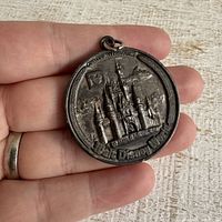 Front view showing full pendant design and scale