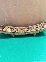 Single ceramic incense burner showing full curved form and four feet