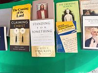 Top view of eight books showing titles and covers including The Coming of the Lord and others