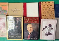 Front covers of eight LDS books including Mine Errand from the Lord, Finding Peace in Our Lives, The Latter-day Saint Woman and others