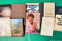 All ten books laid out face up