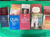 Group shot of all visible books laid out on table
