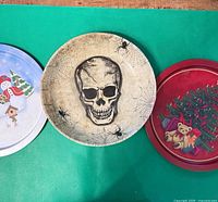 All three trays side by side snowman skull christmas tree