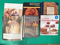 Front covers of all six books laid out side by side