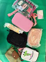 All six bags arranged on green background