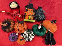 Group shot of pumpkins, doll, haunted house