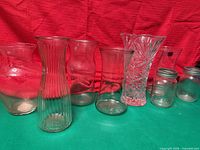 All eight glass pieces lined up to show variety