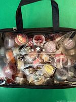 Clear vinyl Scentsy bag filled with many wax sample pods