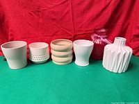 Front view of all six vases / pots lined up