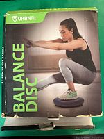 Front of URBNFit Balance Disc retail box showing product image