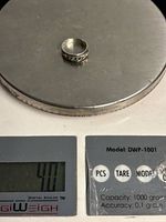 Ring on digital scale displaying 4.0 g