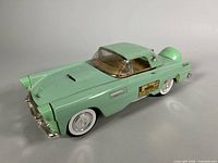 Front left view of mint-green Ford Thunderbird decanter