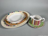 All five Carnival pattern serving pieces grouped