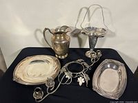 Group view of all five silver plated items