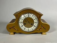 Front view of gold floral Rensie mantel clock