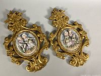 Both plaques front view showing design and condition