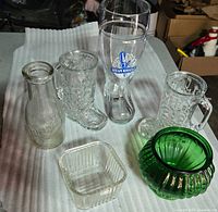 All six glass items arranged on surface
