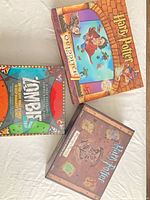 All three board game boxes displayed