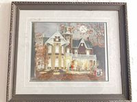 Full view of framed print showing artwork, mat, and frame condition