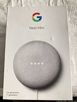 Front of retail box showing Google Nest Mini 2nd generation.