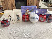 Group shot of all seven ornaments showing two boxed Hallmark Keepsakes and five Twilight Saga ball ornaments