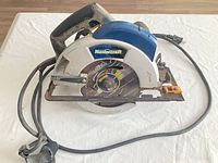Top view of Mastercraft circular saw showing blade, base, cord