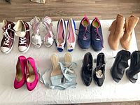 All nine pairs of shoes arranged in two rows