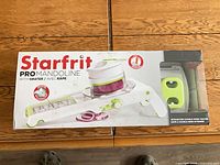 Front view of boxed Starfrit Pro Mandoline