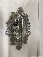 Mirror hung vertically showing front design