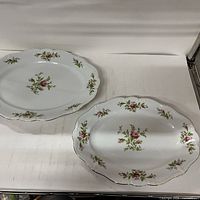 Two oval Johann Haviland Moss Rose platters side by side
