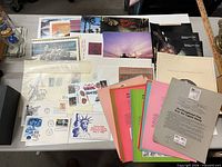 Overview of brochures, first day covers, souvenir sheet, colour sheets