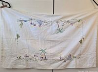 Full view of rectangular embroidered tablecloth