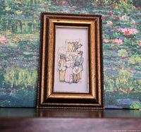 Front view of framed paper sculpture showing artwork and frame