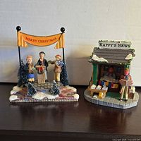 Front view of both figurines showing details