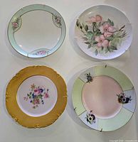 All four decorative plates front view