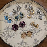 Front view of all ten pairs showing styles, colours and materials