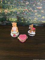 Front view of all three hinged trinket boxes